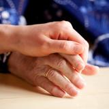 bigstock A young hand comforts and elde 17531153